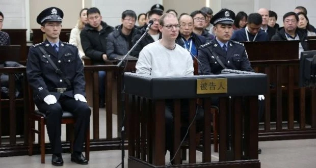 Công dân Canada Robert Lloyd Schellenberg (áo trắng) trong phiên xử phúc thẩm ngày 14-1 tại Trung Quốc. Ảnh: REUTERS