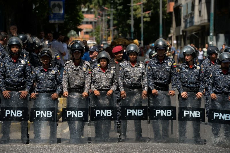 Cảnh sát Venezuela được triển khai giữ an ninh trong biểu tình. Ảnh: AFP