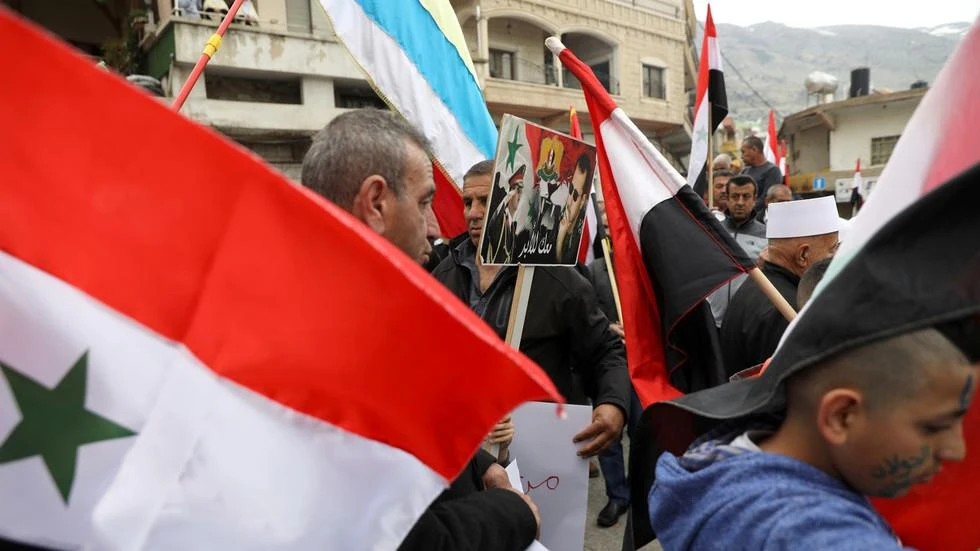 Người Druze ở Syria – một cộng đồng người nói tiếng Ả Rập biểu tình phản đối việc Tổng thống Mỹ Donald Trump công nhận chủ quyền của Israel ở Cao nguyên Golan. Ảnh: REUTERS
