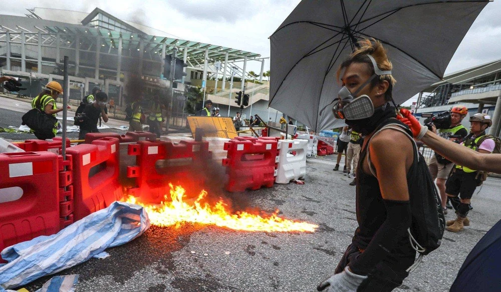 Trung Quốc cho rằng biểu tình nhuốm màu “khủng bố chính trị”. Ảnh: SCM