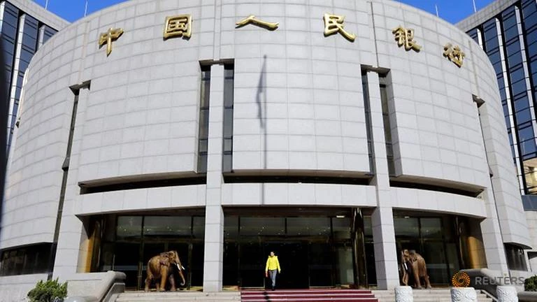 Ngân hàng Trung ương Trung Quốc sẽ bơm 1.200 tỉ nhân dân tệ (tương đương 173,8 tỉ USD) vào thị trường hỗ trợ kinh tế chống chọi với dịch Corona. Ảnh: REUTERS