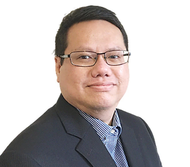 Tiến sĩ Hồ Quốc Tuấn, chuyên gia tài chính, giảng viên tại ĐH Bristol (Anh). Ảnh: Chuyên gia cung cấp