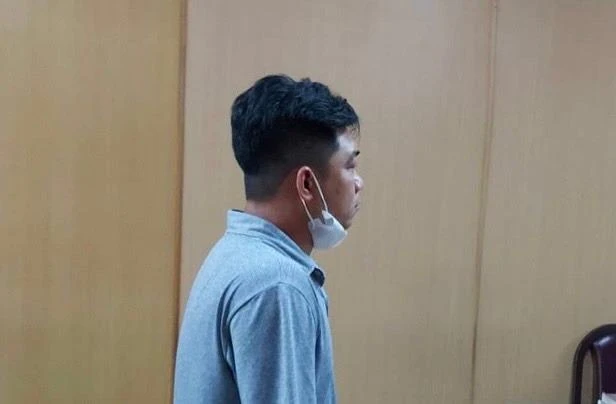 Nguyễn Văn Đạt tại phiên xử sáng 15-7. Ảnh: H.YẾN