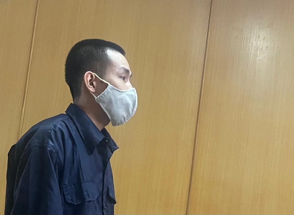 Bị cáo Lê Minh Tuấn tại phiên xử sáng 22-11. Ảnh: H.YẾN