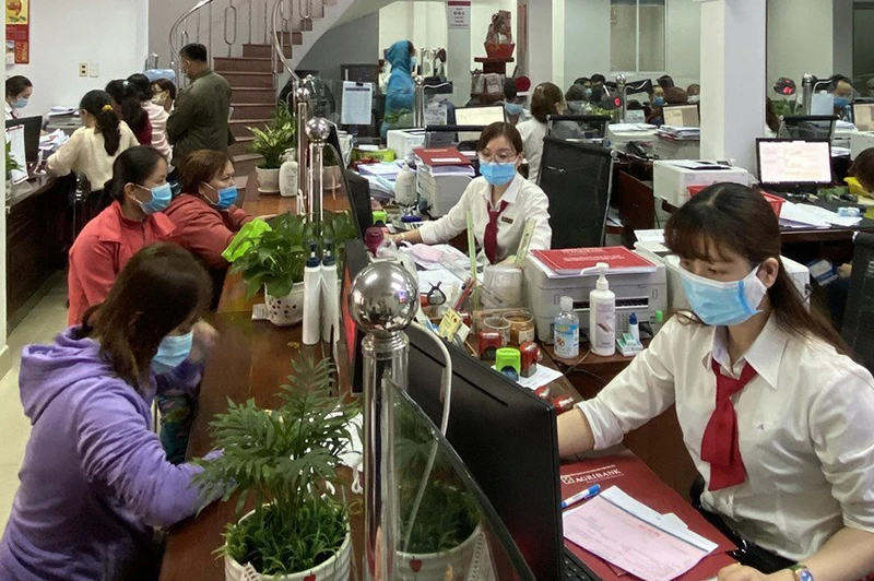 Các ngân hàng vẫn đang nỗ lực giải ngân gói hỗ trợ 40.000 tỉ đồng. Ảnh: T.LINH