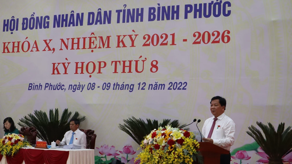 Ông Trần Văn Mi- Phó Chủ tịch UBND tỉnh Bình Phước trình bày báo cáo cảu UBND tỉnh Bình Phước. Ảnh: DH