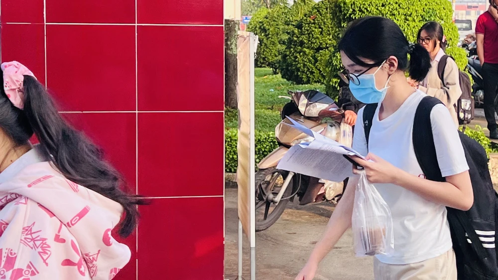 Vẫn tranh thủ ôn bài và kèm thêm ly cà phê cho tỉnh táo trước khi bước vào thi. Ảnh: LÊ ÁNH