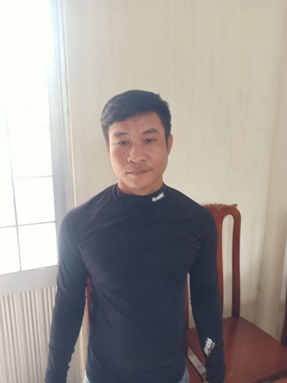 Bị can Nguyễn Hoàng Em
