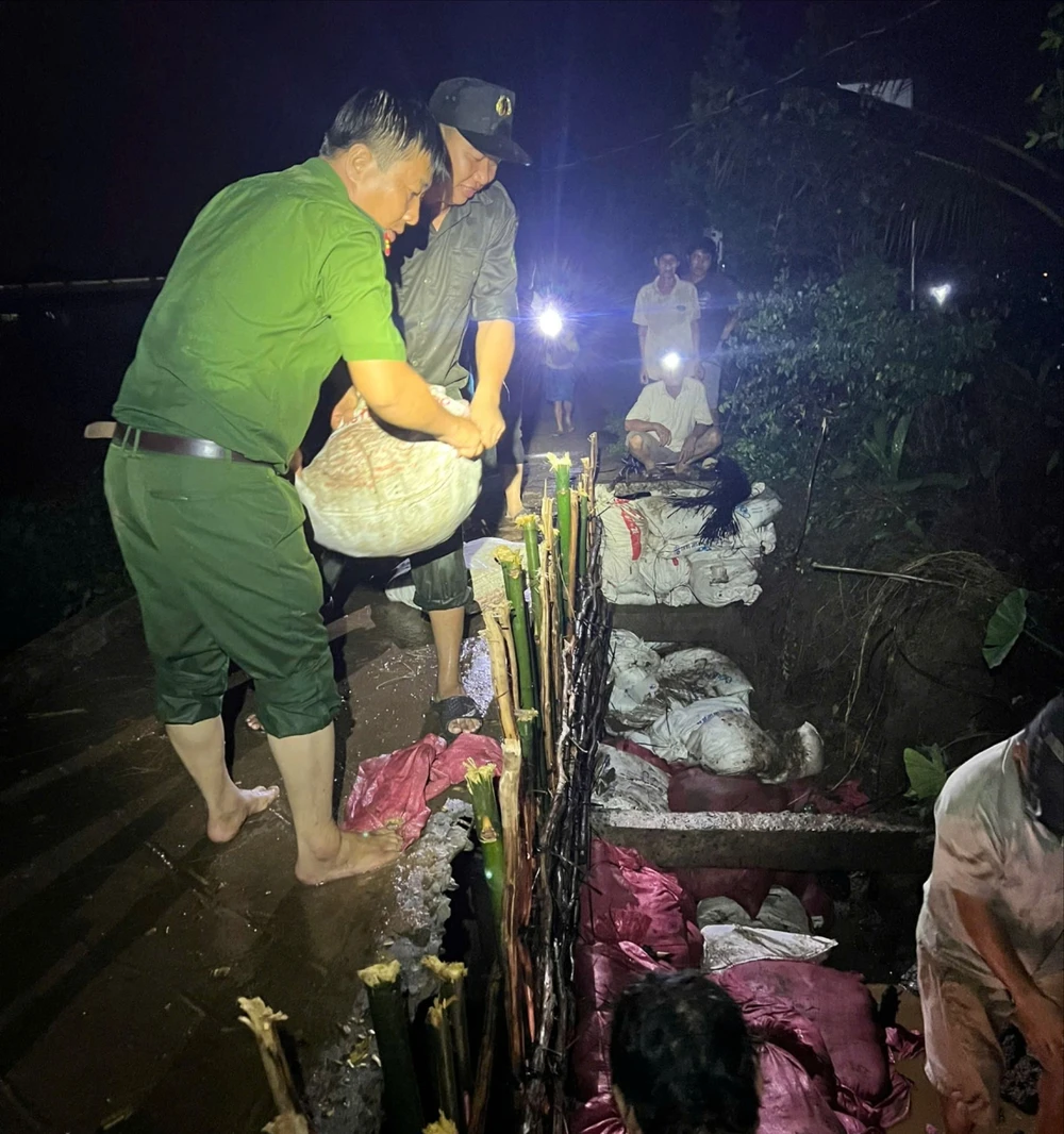 vỡ đê,công an xã, đồng tháp