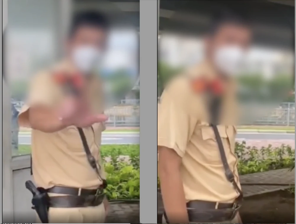 Vị CSGT bị thanh niên tố nhận một triệu đồng trên đường Võ Văn Kiệt. Ảnh chụp màn hình.