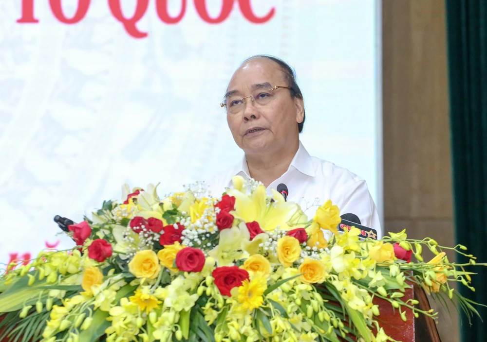 Chủ tịch nước Nguyễn Xuân Phúc phát biểu kết luận hội thảo. Ảnh: T.THẢO