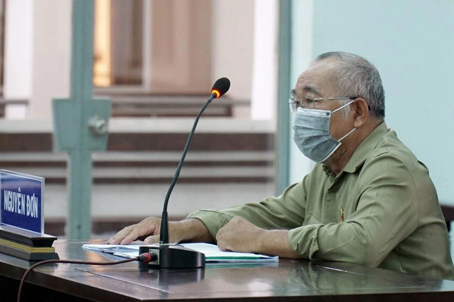 Ông Nguyễn Văn Bình tại phiên xử ngày 20-4. Ảnh: HH