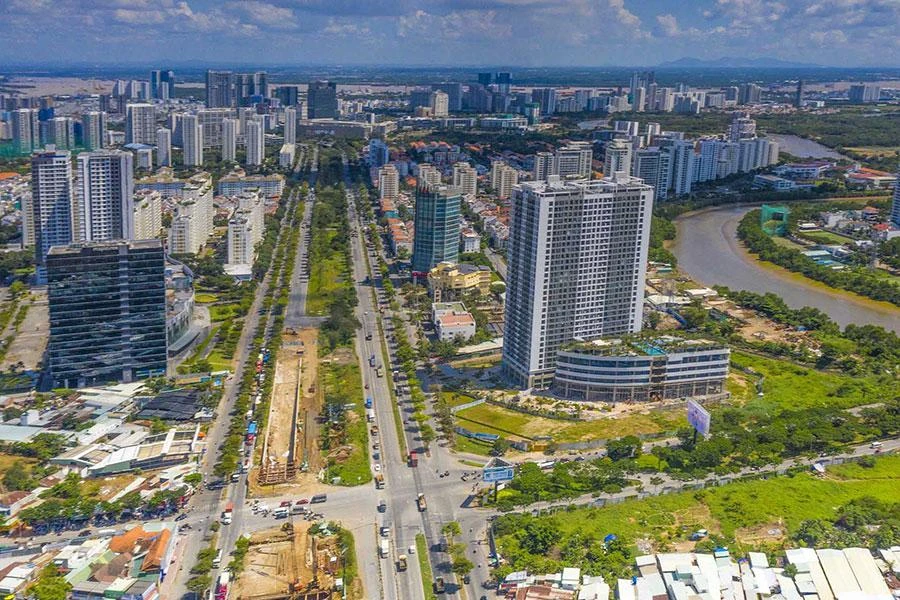 Các chuyên gia cho rằng vấn đề xử lý chênh lệch địa tô đối với đất đai của người dân do Nhà nước đầu tư hạ tầng tiềm ẩn nhiều bất công xã hội. Ảnh: HOÀNG GIANG