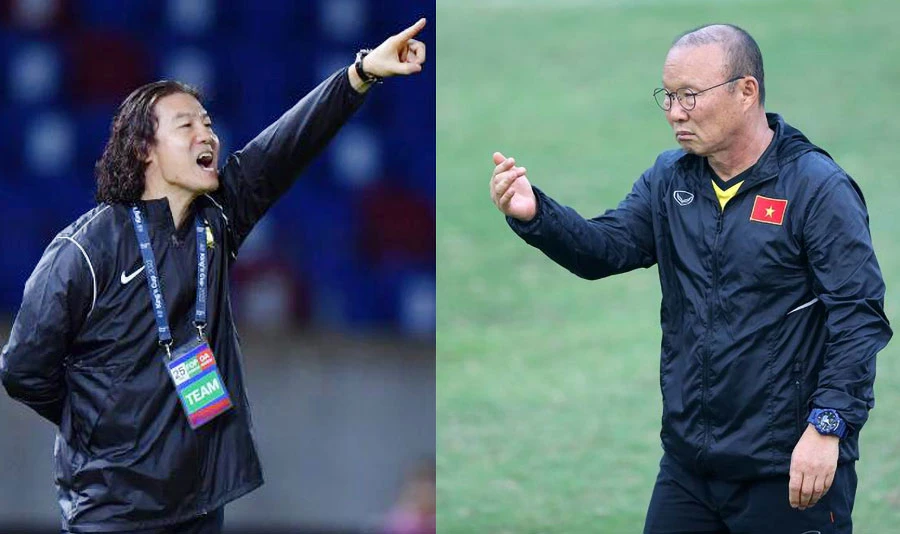 HLV Kim Pan-gon và HLV Park Hang-seo “nắn gân” nhau. Ảnh: ANH PHƯƠNG