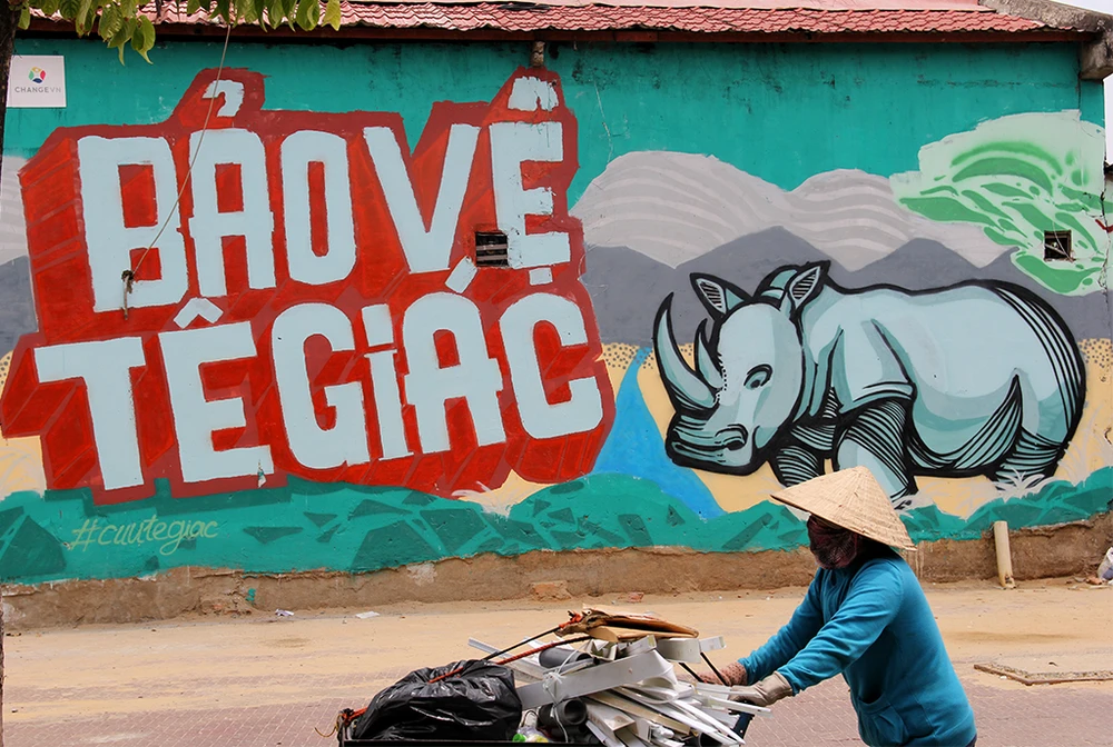 Ngắm những bức tường bẩn ở quận 1 được thay áo mới ảnh 2