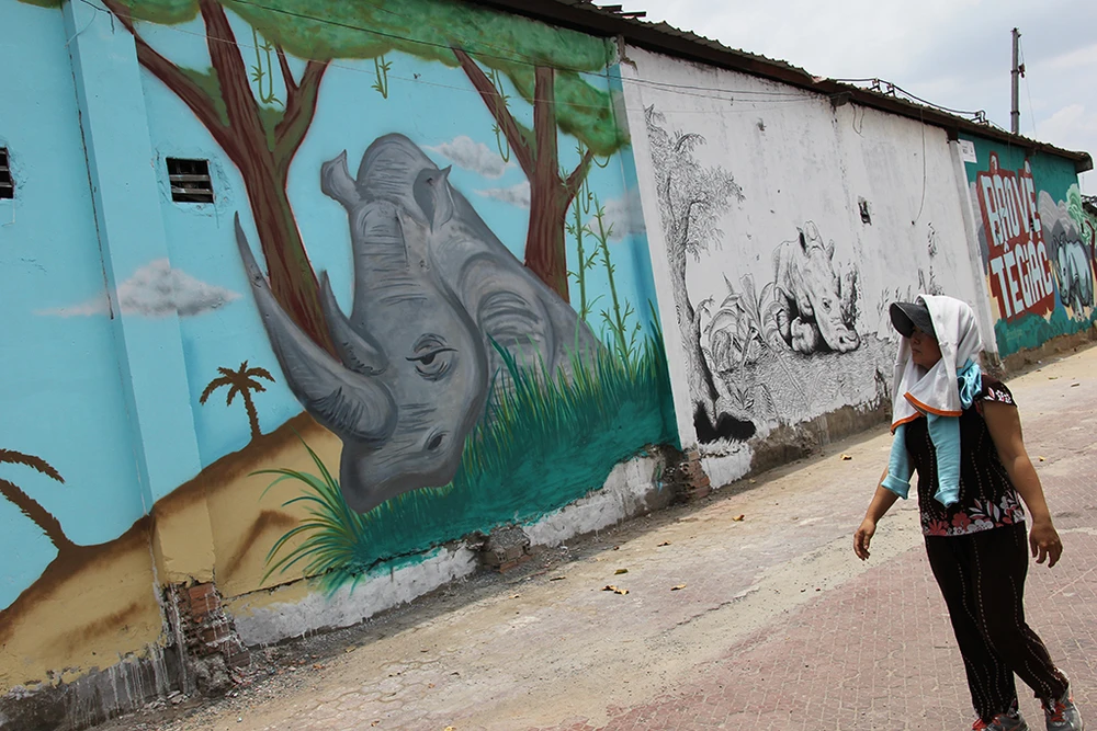 Ngắm những bức tường bẩn ở quận 1 được thay áo mới ảnh 3