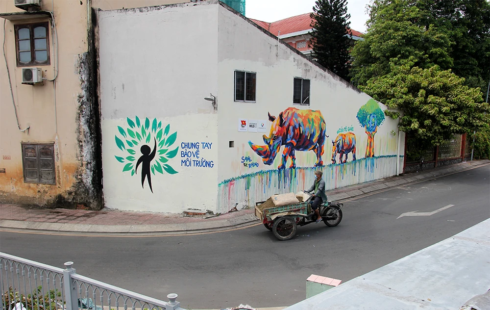 Ngắm những bức tường bẩn ở quận 1 được thay áo mới ảnh 5