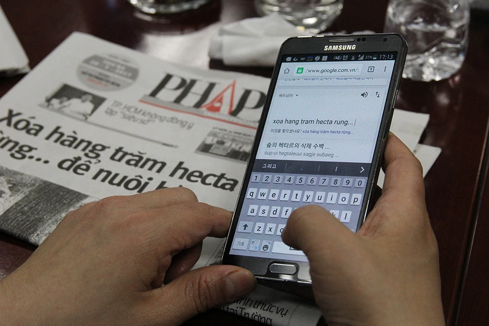 Đoàn Hội nhà báo Hàn Quốc thăm báo Pháp Luật TP.HCM ảnh 9