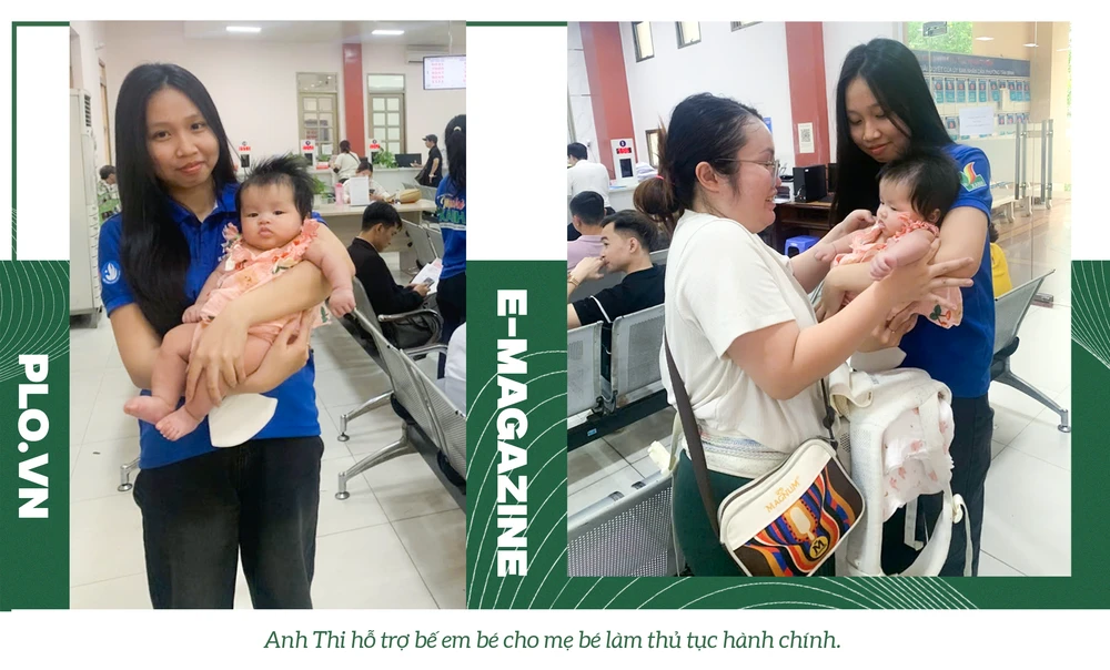 Anh Thi hỗ trợ bế em bé cho mẹ bé làm thủ tục hành chính.png