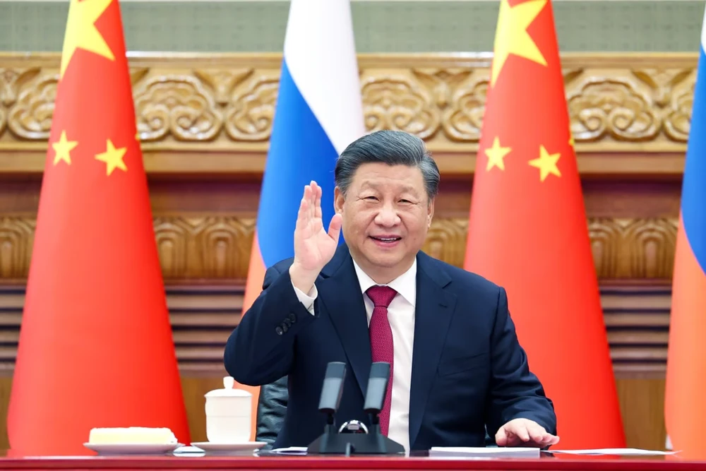 Chủ tịch Trung Quốc Tập Cận Bình chào Tổng thống Nga Vladimir Putin trong cuộc gặp trực tuyến. Ảnh: TÂN HOA XÃ Chủ tịch Trung Quốc Tập Cận Bình chào Tổng thống Nga Vladimir Putin trong cuộc gặp trực tuyến. Ảnh: TÂN HOA XÃ