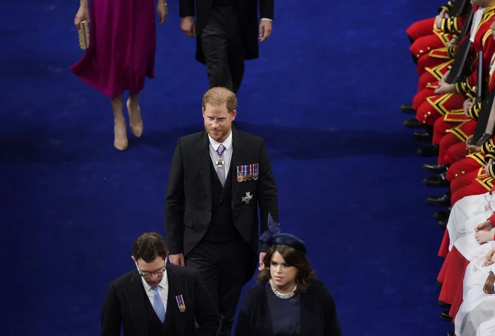 Prince Harry, William's brother, enters Westminster Abbey. <a href="https://www.cnn.com/uk/live-news/king-charles-iii-coronation-ckc-intl-gbr/h_d46a1c2f25cd5c5ed888c323a5411ae9" target="_blank">He accepted the invitation to his father's coronation</a> but was without his wife, Meghan, who stayed back in California with the couple's two children.