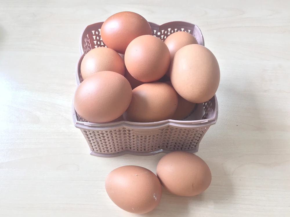 Trẻ nhỏ ăn lòng đỏ trứng có thể tăng cường trí nhớ. Ảnh: NHẬT LINH