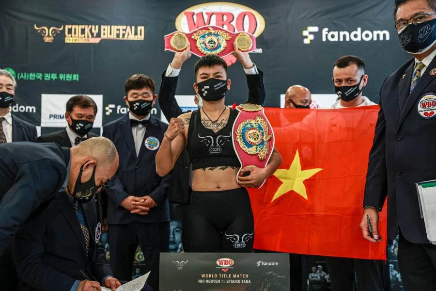 Võ sĩ Thu Nhi: Từ cô bé bán vé số đến nhà vô địch quyền Anh chuyên nghiệp ảnh 5