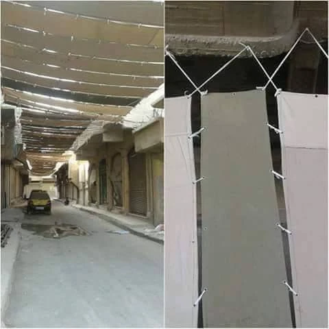 IS phủ bạt toàn thành trì Raqqa để tránh bị theo dõi ảnh 1