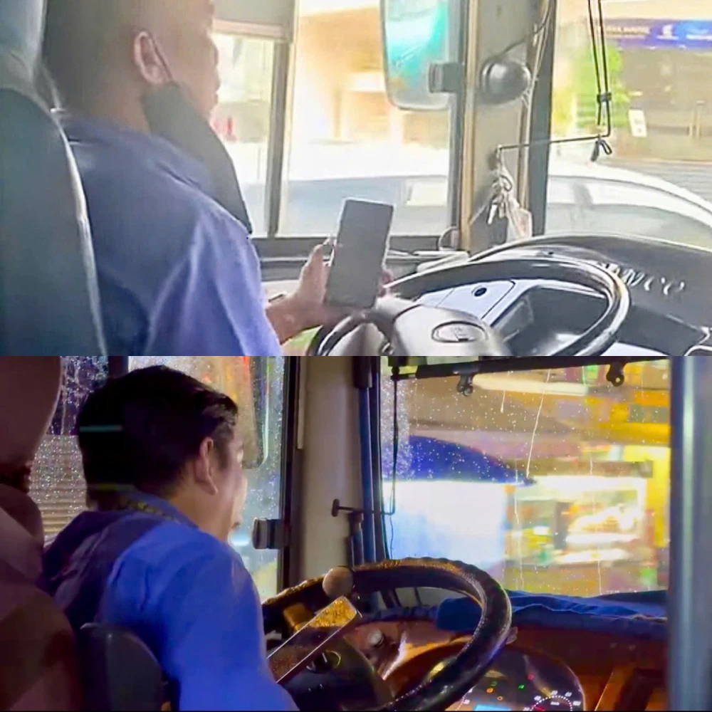 Tài xế vừa chạy xe vừa nói chuyện điện thoại. Ảnh cắt từ clip