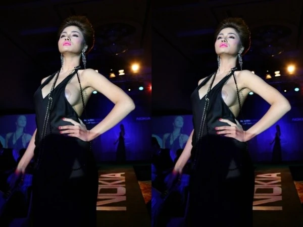 Với trang phục cắt xẻ sâu, Vũ Thu Phương đã bị lộ hàng trên sân khấu.