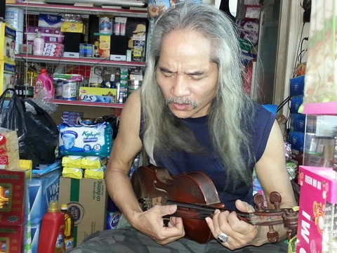 Nhạc sĩ Lê Trung Tín: Tiếng vĩ cầm giữa chợ nhớ về Hà Nội ảnh 1