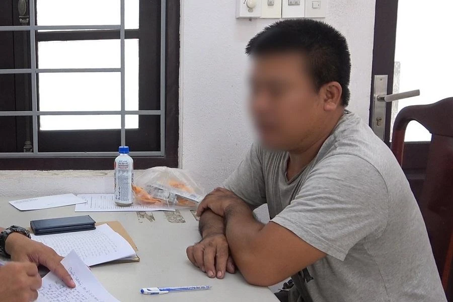 Phan Văn D tại cơ quan công an.