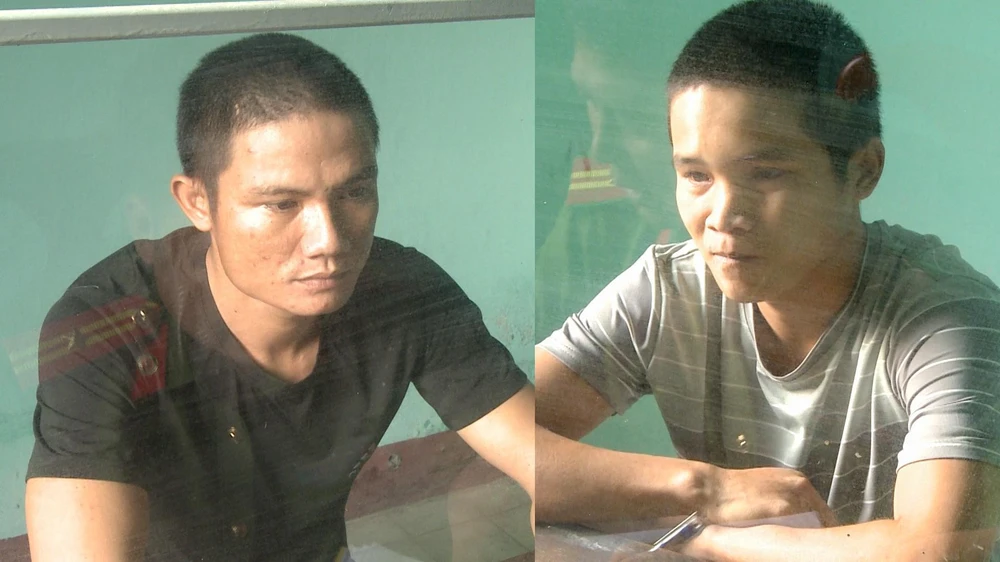 Nguyễn Trường Linh và Nguyễn Văn Nhật tại công an.