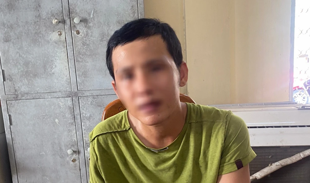 Nguyễn Đức Long tại cơ quan công an.