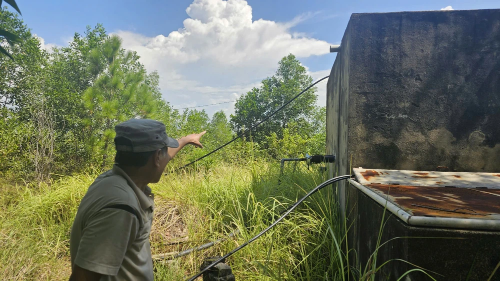 nguoi-dan-hai-hung-vi-gan-10-nam-su-dung-nuoc-o-nghia-trang (1).jpg