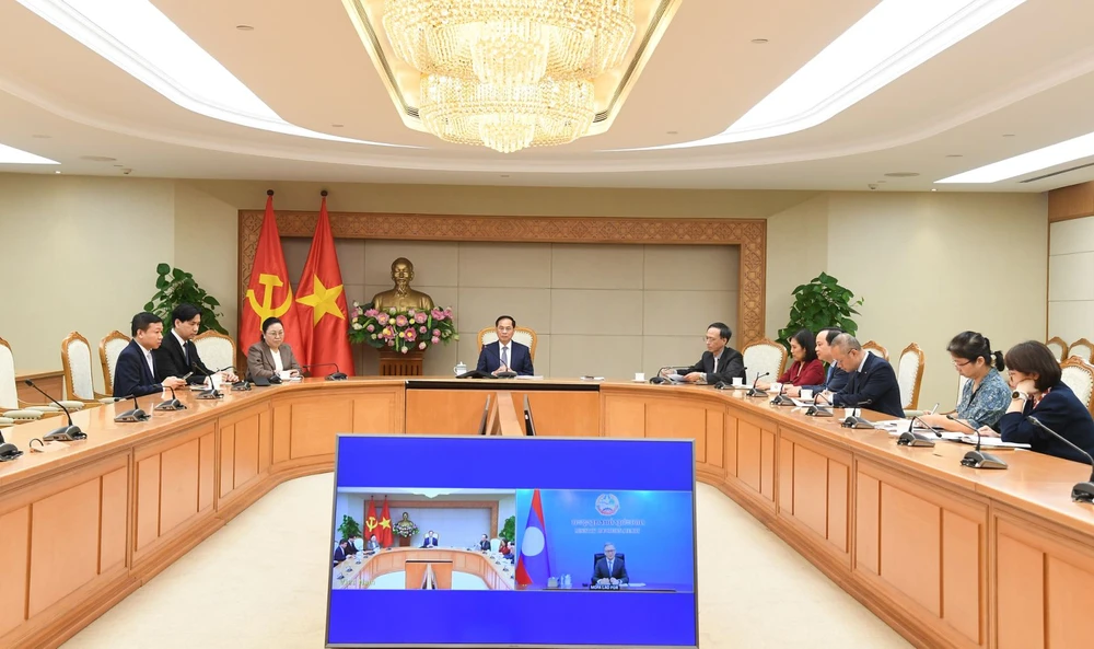 Việt Nam - Lào trao đổi tình hình khu vực và quốc tế