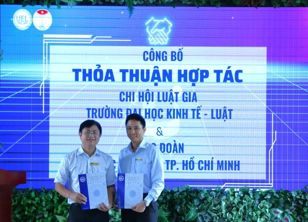 Chi hội Luật gia Trường ĐH Kinh tế - Luật ký thỏa thuận hợp tác với Công đoàn ĐH Quốc gia TP.HCM. Ảnh: UEL