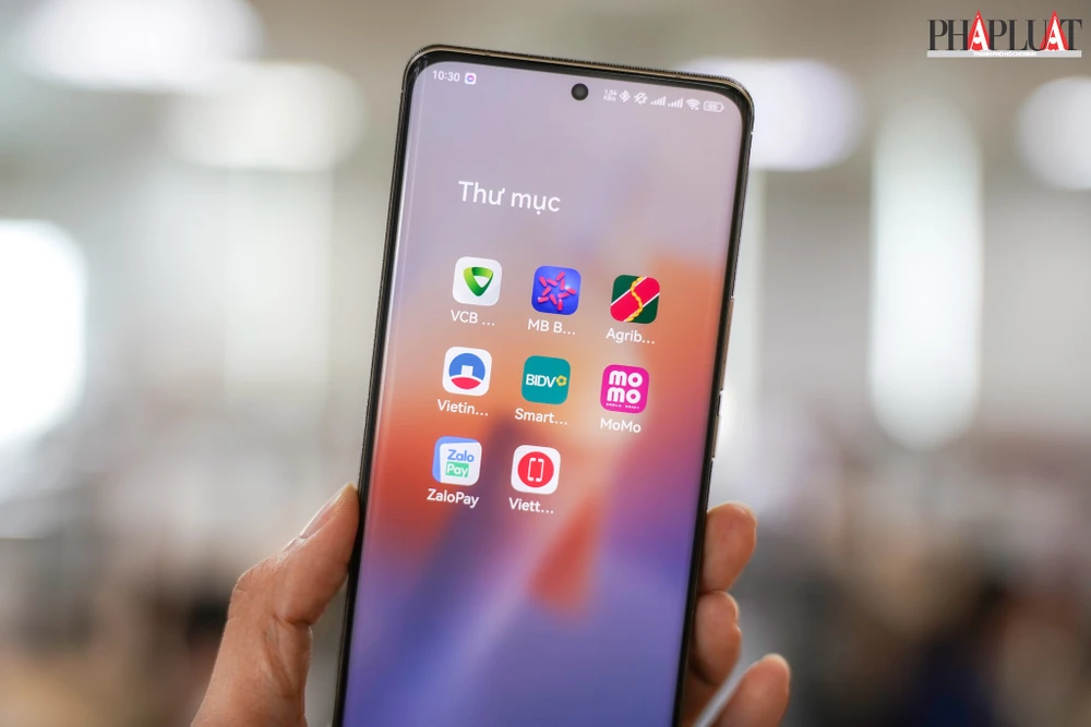 Người dùng ngân hàng nên xác thực bằng khuôn mặt trước ngày 1-7-2024. Ảnh: MINH HOÀNG