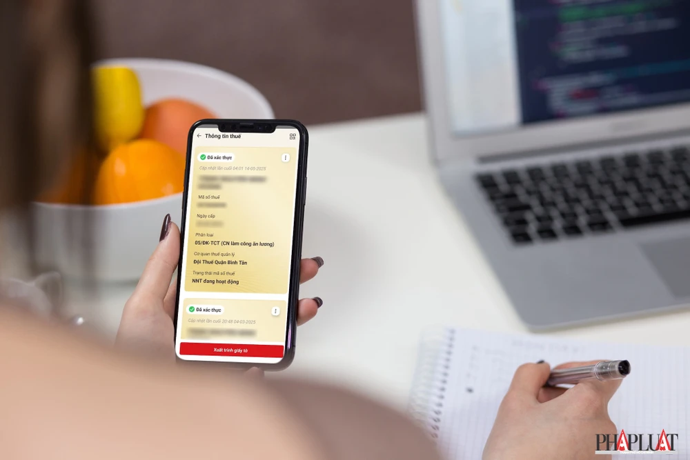 Cách tích hợp mã số thuế vào ứng dụng VNeID. Ảnh: MINH HOÀNG/Canva