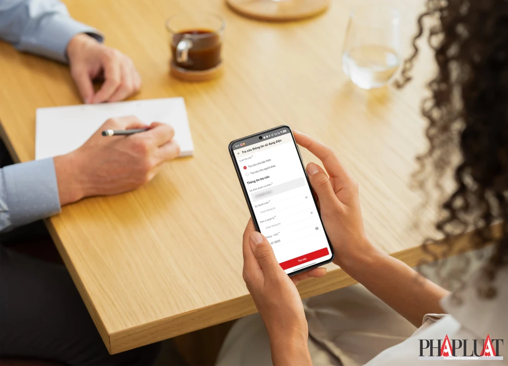 Cách tra cứu tiền điện, lượng điện năng tiêu thụ hàng tháng ngay trên ứng dụng VNeID. Ảnh: MINH HOÀNG