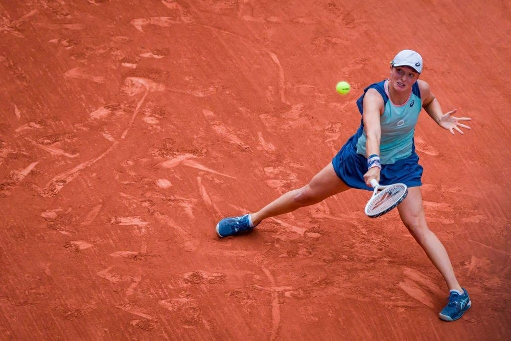 Chơi rất hay trên sân đất nện nhưng mặt sân cỏ Wimbledon không phải là sở trường của Swiatek. Ảnh: GETTY Chơi rất hay trên sân đất nện nhưng mặt sân cỏ Wimbledon không phải là sở trường của Swiatek. Ảnh: GETTY