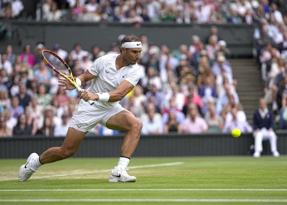 Nadal chỉ mới hai lần đăng quang tại Wimbledon 2008 và 2010. Ảnh: GETTY Nadal chỉ mới hai lần đăng quang tại Wimbledon 2008 và 2010. Ảnh: GETTY