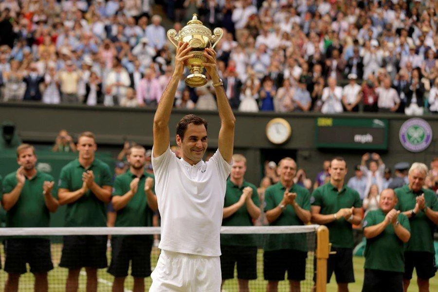 Roger Federer tám lần vô địch Grand Slam trên mặt sân cỏ. Ảnh: AP