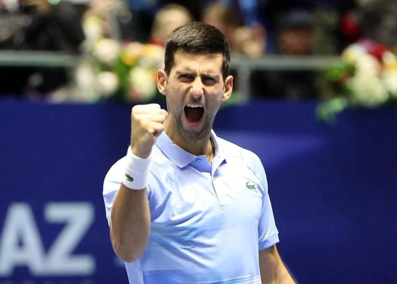 Djokovic ăn mừng chức vô địch Astana Open, đủ điều kiện tham dự ATP Finals. Ảnh: REUTERS