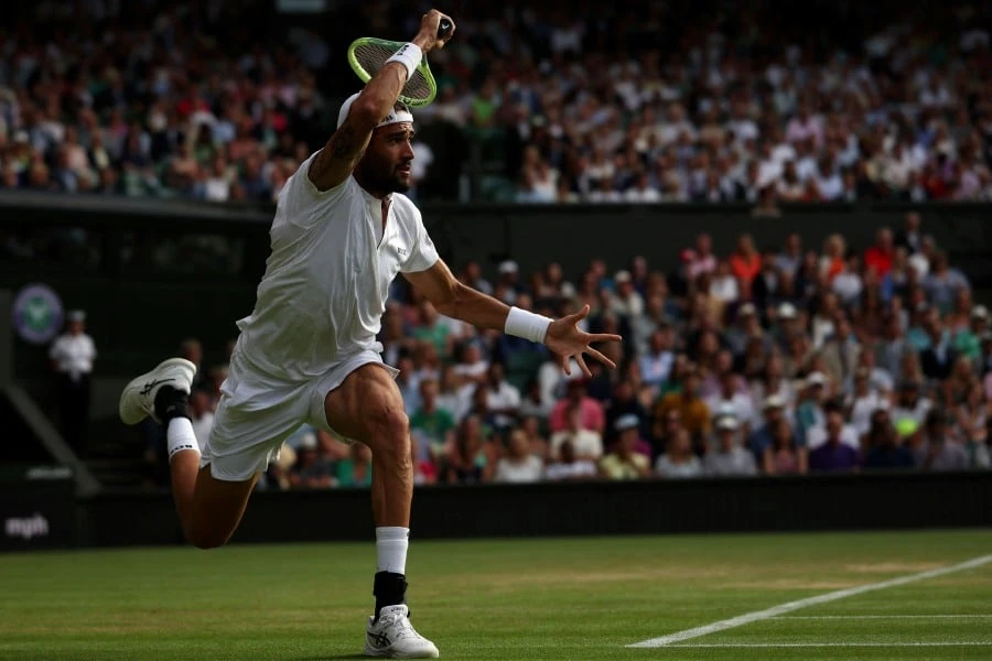 Á quân 2021 Berrettini thua ngược trước đối thủ số 1 thế giới. Ảnh: GETTY