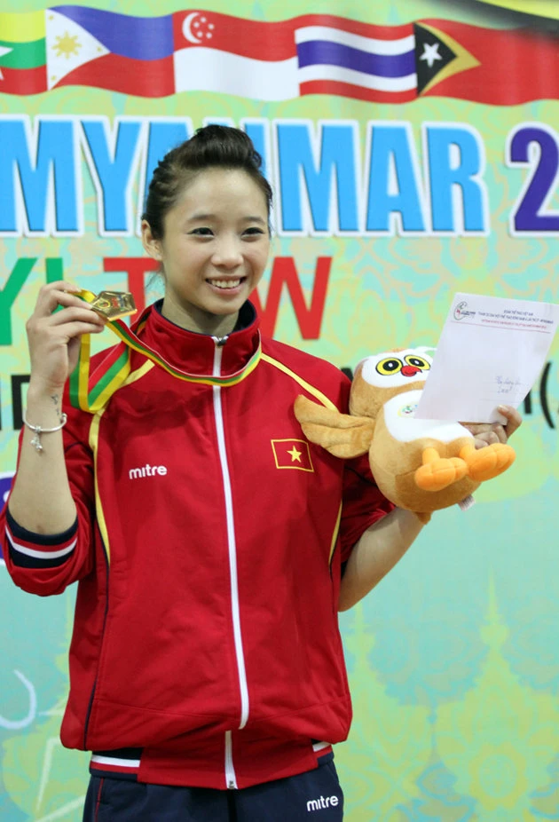 Ngắm 'thiên thần' Wushu Thúy Vi trên bục nhận HCV ảnh 4