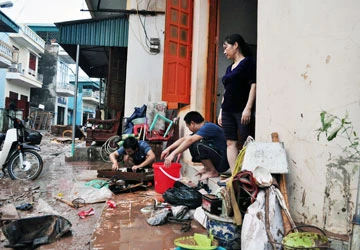 Hậu siêu bão Haiyan:1.000 căn nhà chìm trong biển nước ảnh 4