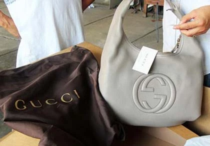 Truy nã quốc tế “ông trùm” hàng hiệu Gucci - Milano tại Việt Nam ảnh 1