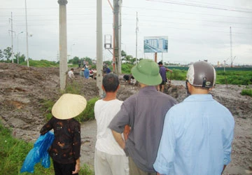 Vụ gần 50 ngôi mộ bị lấp trong đêm ở Hà Nội: Đủ căn cứ khởi tố hình sự! ảnh 1