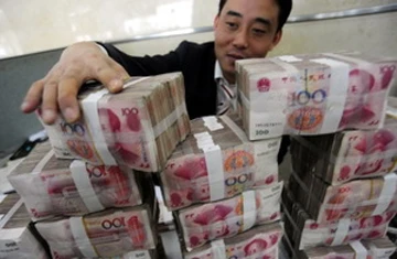 Trung Quốc sẽ tiếp tục điều chỉnh đồng nhân dân tệ ảnh 1